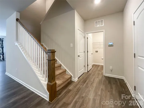 a view of a back yard of the house