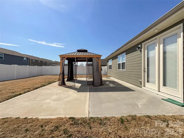 a view of a house with a patio