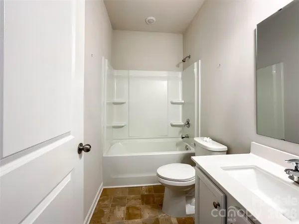 a view of a livingroom with wooden floor