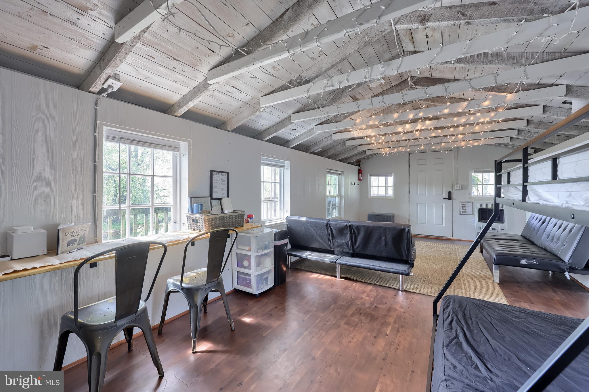 283 Skyview Lane Lititz, PA 17543 - Photo 19 of 28 a living room with furniture and a wooden floor
