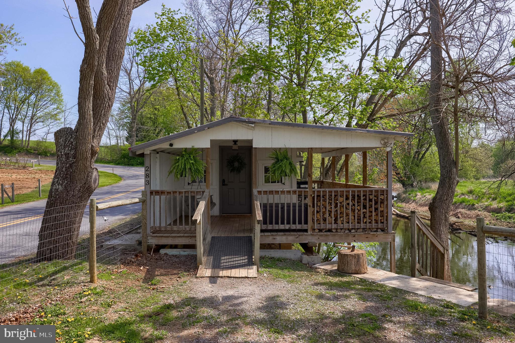 283 Skyview Lane Lititz, PA 17543 - Photo 2 of 28 a view of a chair and table in backyard