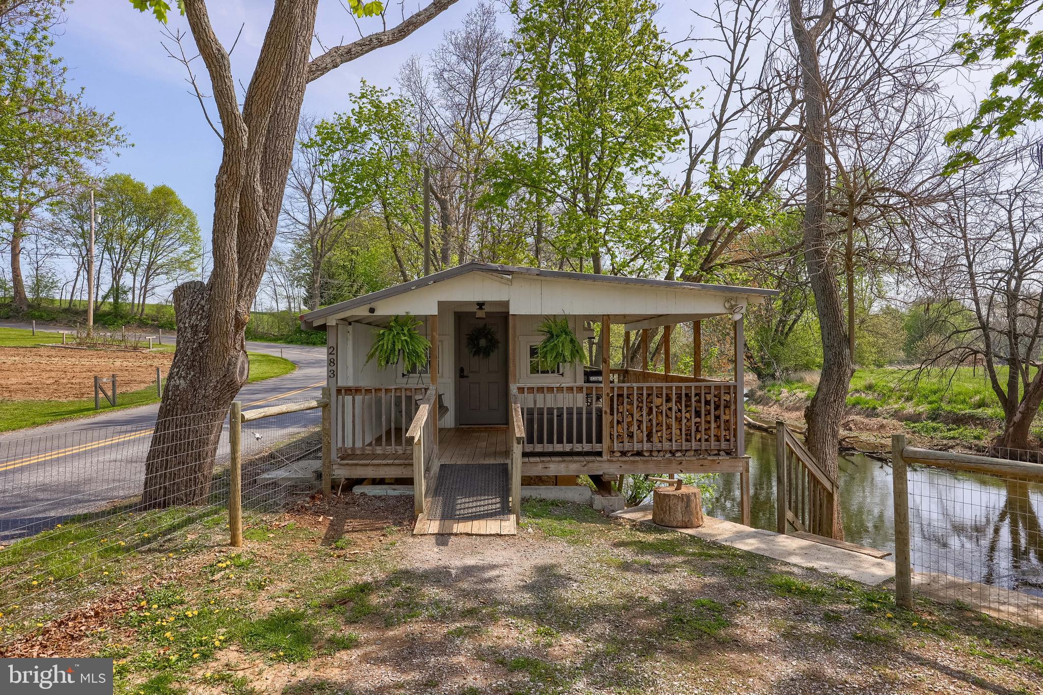 283 Skyview Lane Lititz, PA 17543 - Photo 8 of 28 a view of a chair and table in backyard of the house