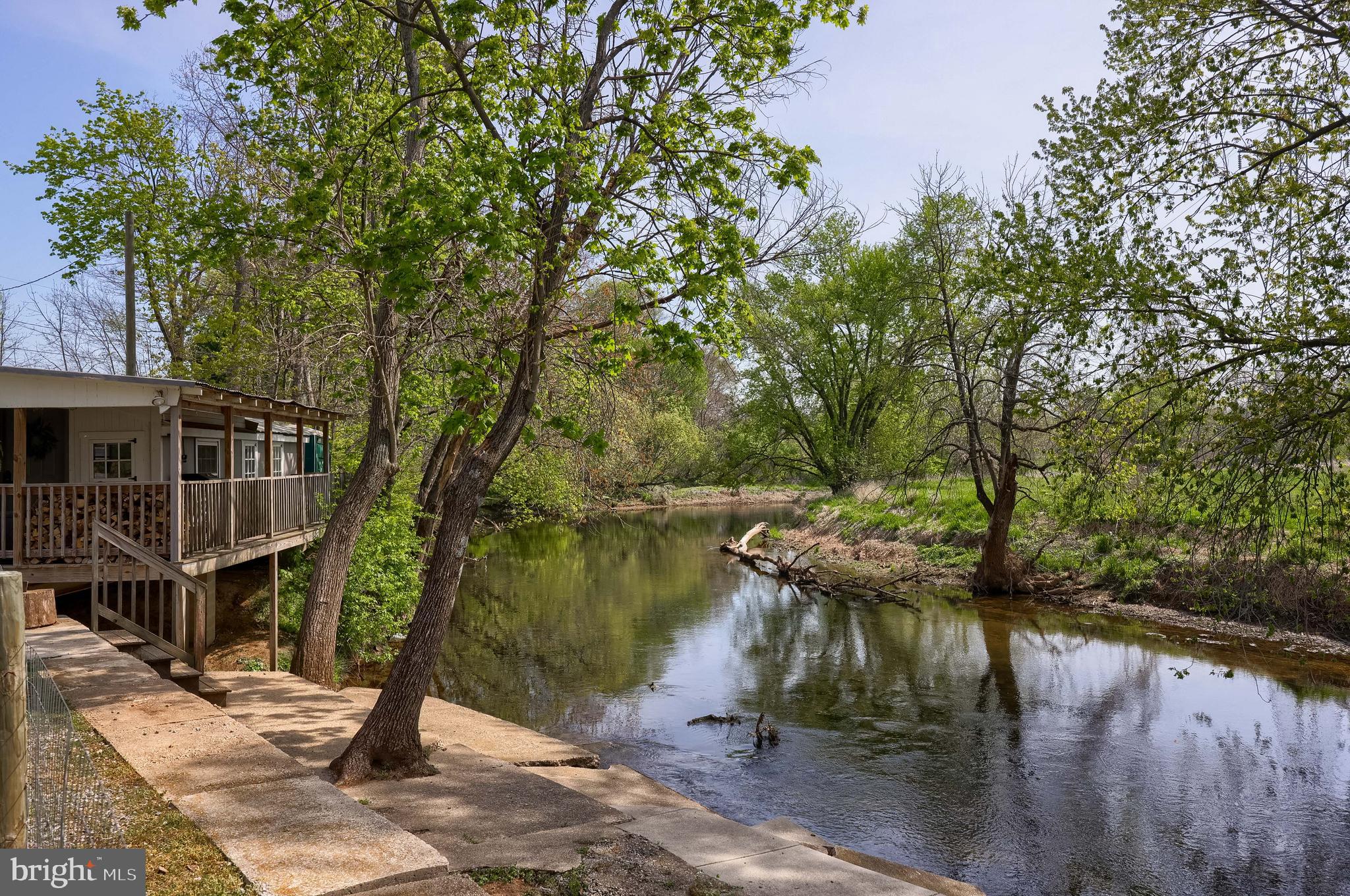 283 Skyview Lane Lititz, PA 17543 - Photo 10 of 28 a view of a lake with a building in the background