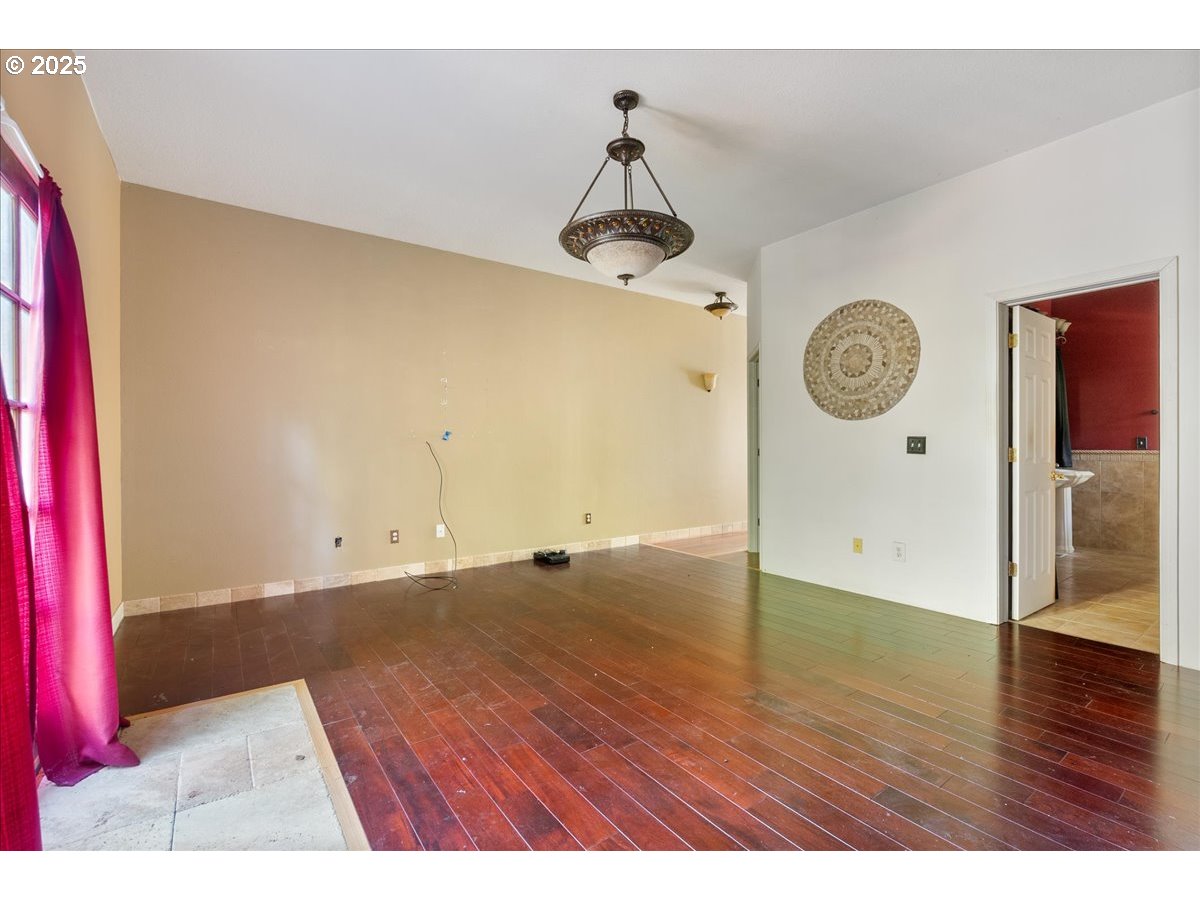 2617 Northeast 166th Street Ridgefield, WA 98642 - Photo 33 of 35 a view of a room with wooden floor