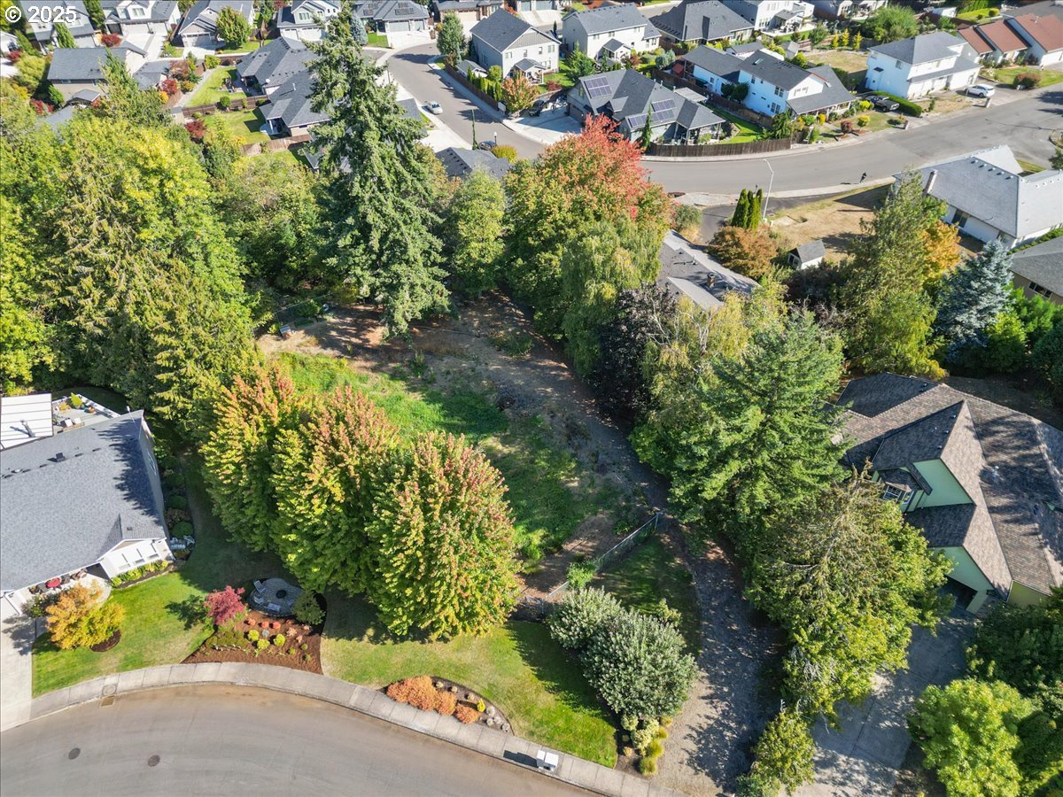 2617 Northeast 166th Street Ridgefield, WA 98642 - Photo 6 of 35 an aerial view of a house with a yard and garden