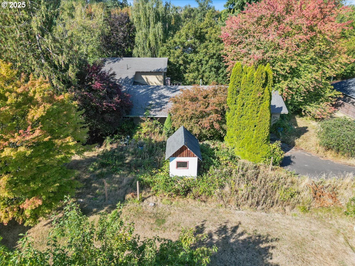 2617 Northeast 166th Street Ridgefield, WA 98642 - Photo 7 of 35 a view of a house with a yard and large trees