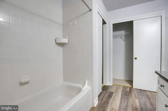 a view of a balcony with wooden floor