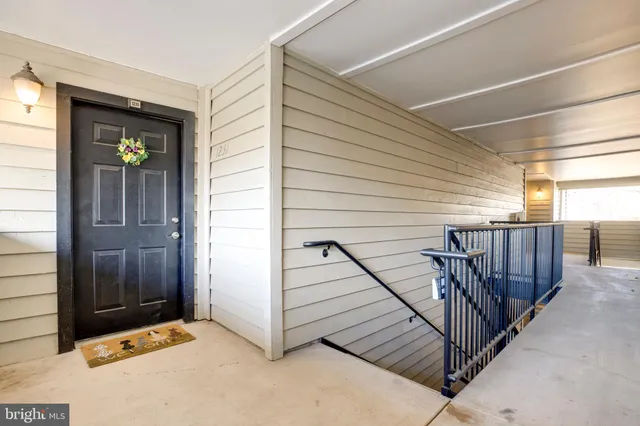 a view of a balcony with staircase