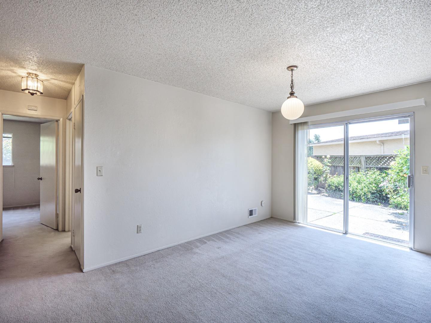 450 Spruce Circle Watsonville, CA 95076 - Photo 18 of 30 a view of an empty room with a window