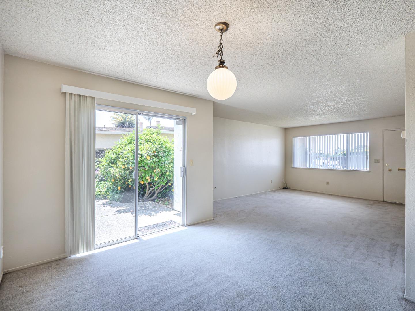 450 Spruce Circle Watsonville, CA 95076 - Photo 19 of 30 a view of an empty room with a window