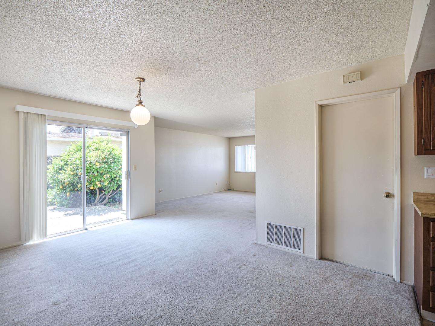 450 Spruce Circle Watsonville, CA 95076 - Photo 20 of 30 an empty room with windows and outdoor view