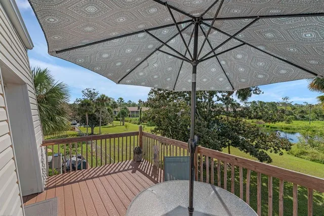 a view of a balcony with an outdoor space