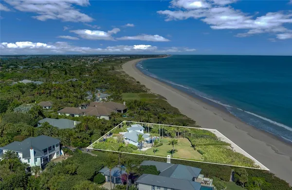 a view of a lake with a garden