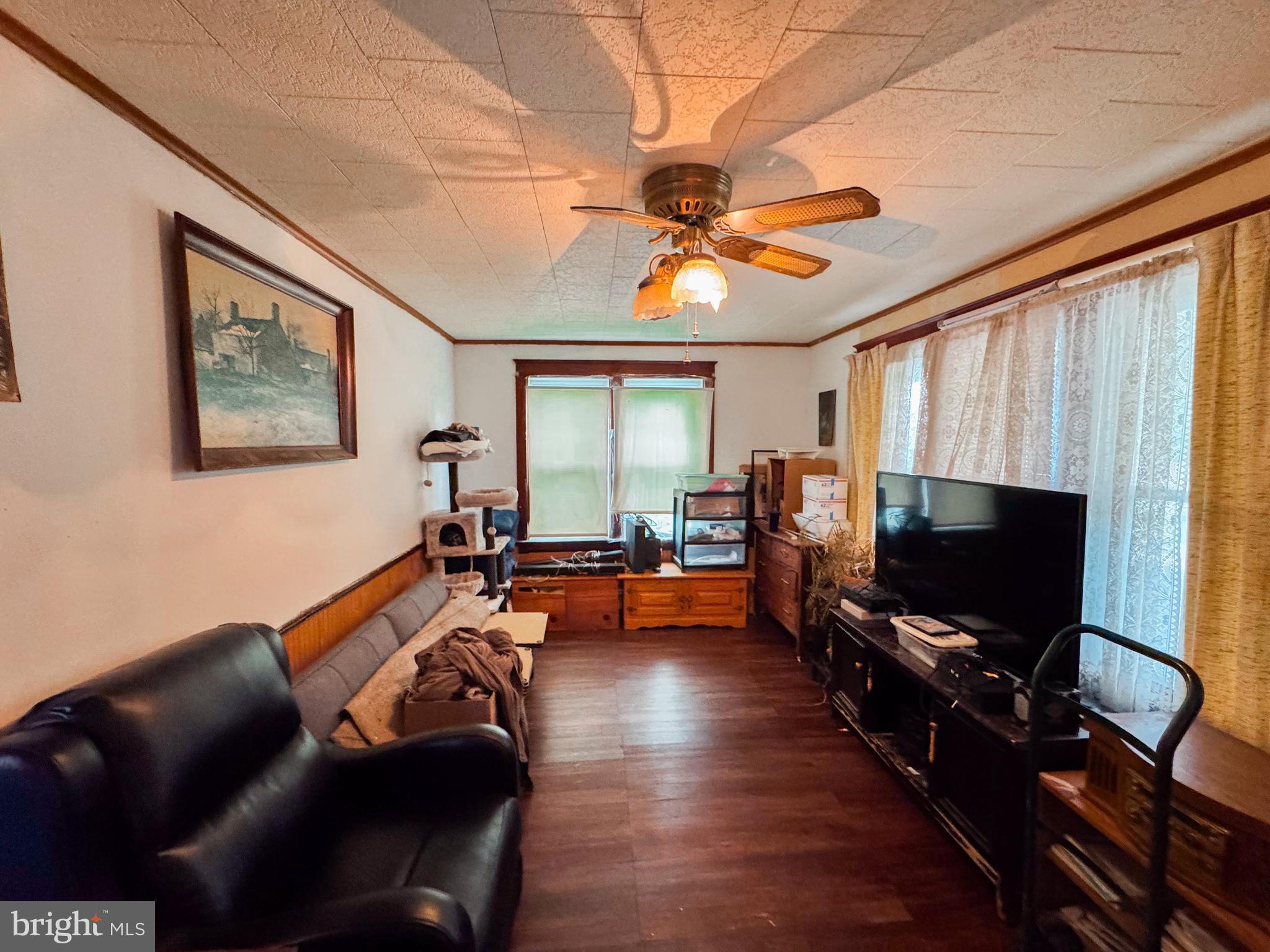 416 Dry Valley Road Burnham, PA 17009 - Photo 10 of 23 a living room with furniture and a flat screen tv