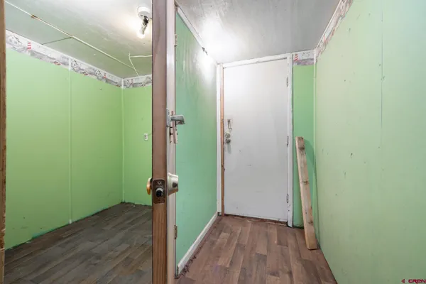 a bathroom with a glass shower door