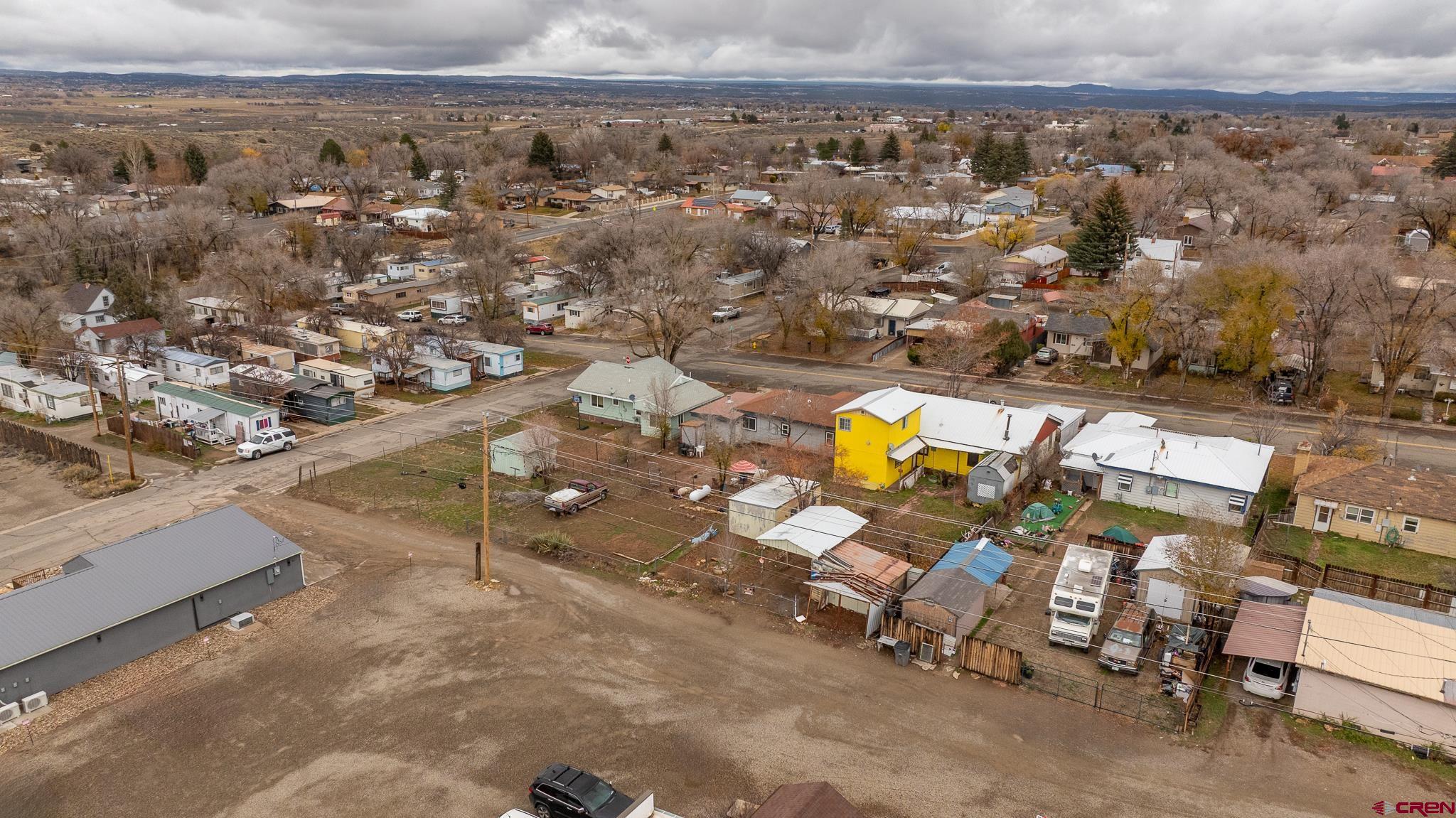 537 North Elm Street Cortez, CO 81321 - Photo 37 of 41 an aerial view of residential houses with outdoor space
