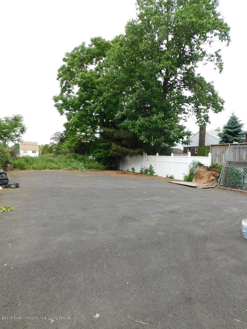 104 Willowbrook Road Staten Island, NY 10302 - Photo 5 of 16 a view of a house with a yard