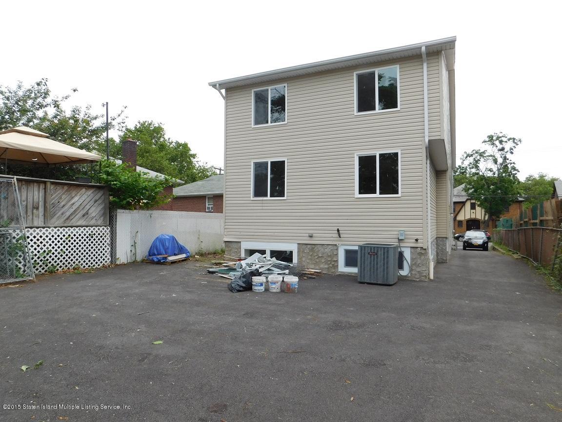 104 Willowbrook Road Staten Island, NY 10302 - Photo 6 of 16 a view of a house with a yard and sitting area