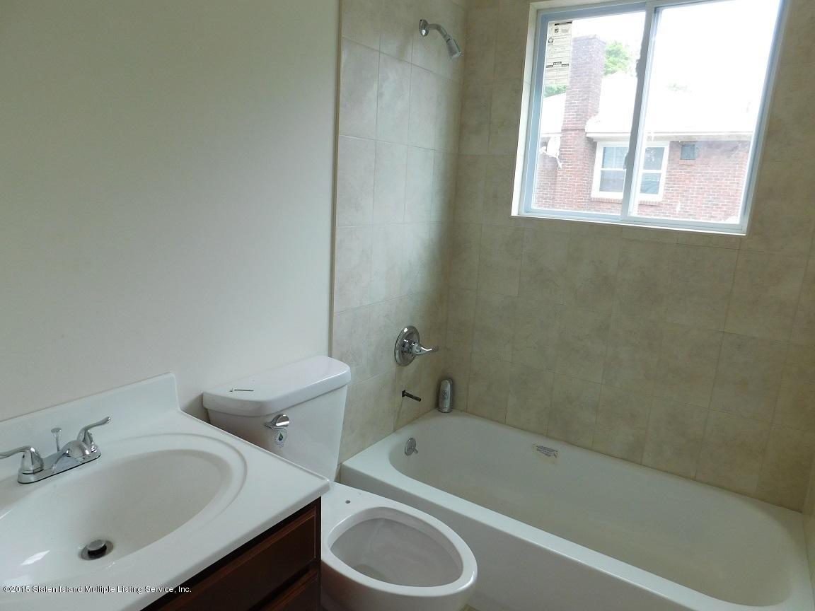 104 Willowbrook Road Staten Island, NY 10302 - Photo 9 of 16 a bathroom with a sink toilet and bathtub