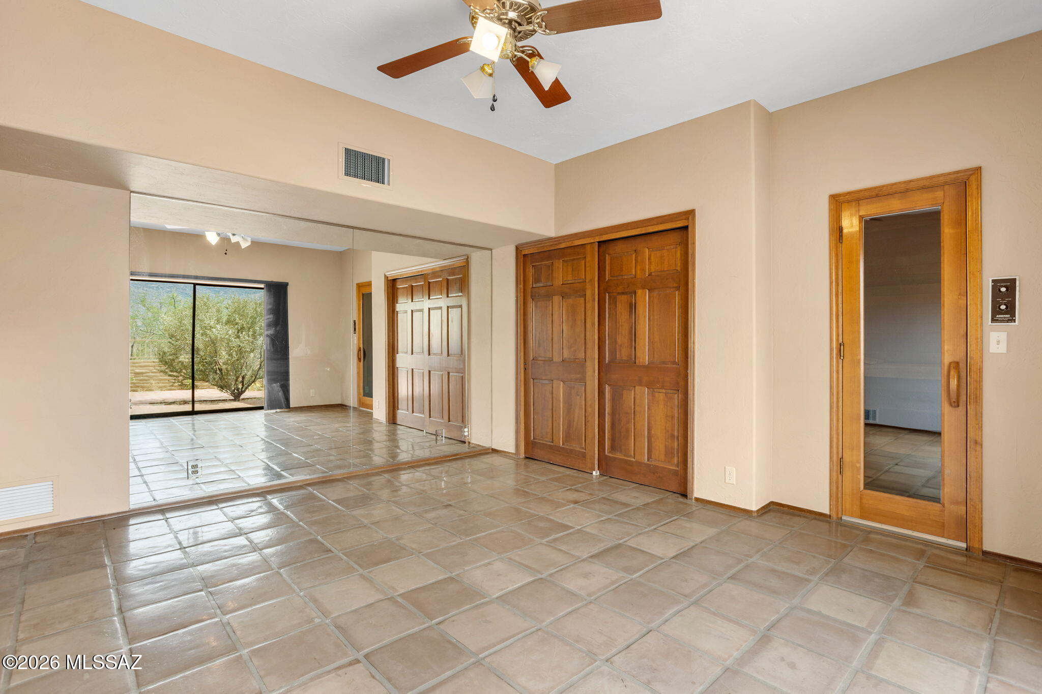 7171 South X9 Ranch Road Vail, AZ 85641 - Photo 41 of 50 Mirrored wall, closet, & sauna in Bedroom 5 makes it a nice Fitness Rm!