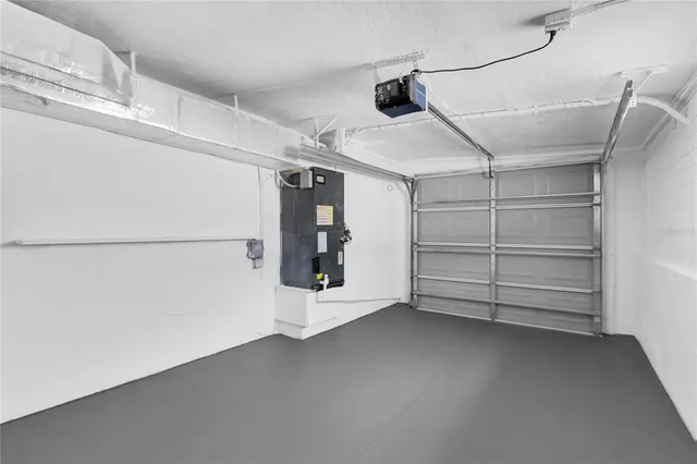 a view of yard with swimming pool and green space