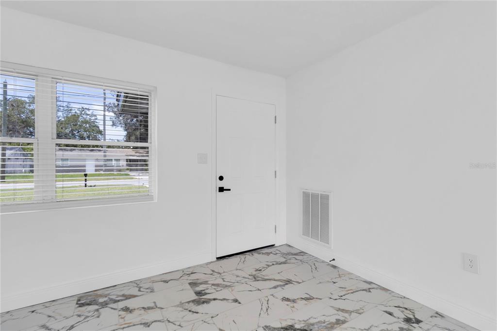 7320 Oelsner Street New Port Richey, FL 34652 - Photo 3 of 29 a view of an empty room
