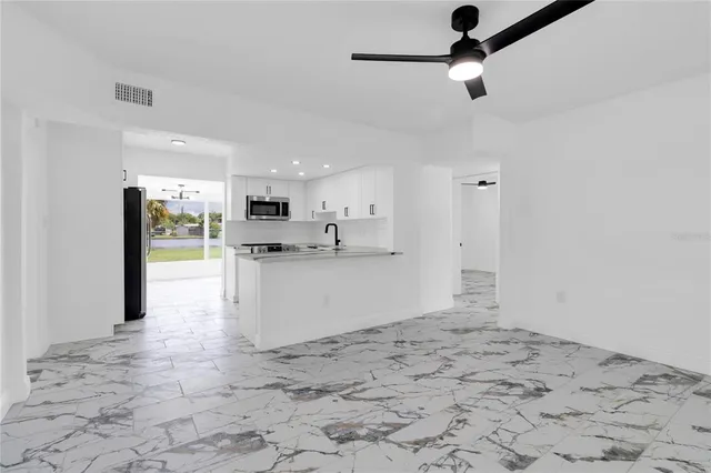 a view of kitchen and utility room