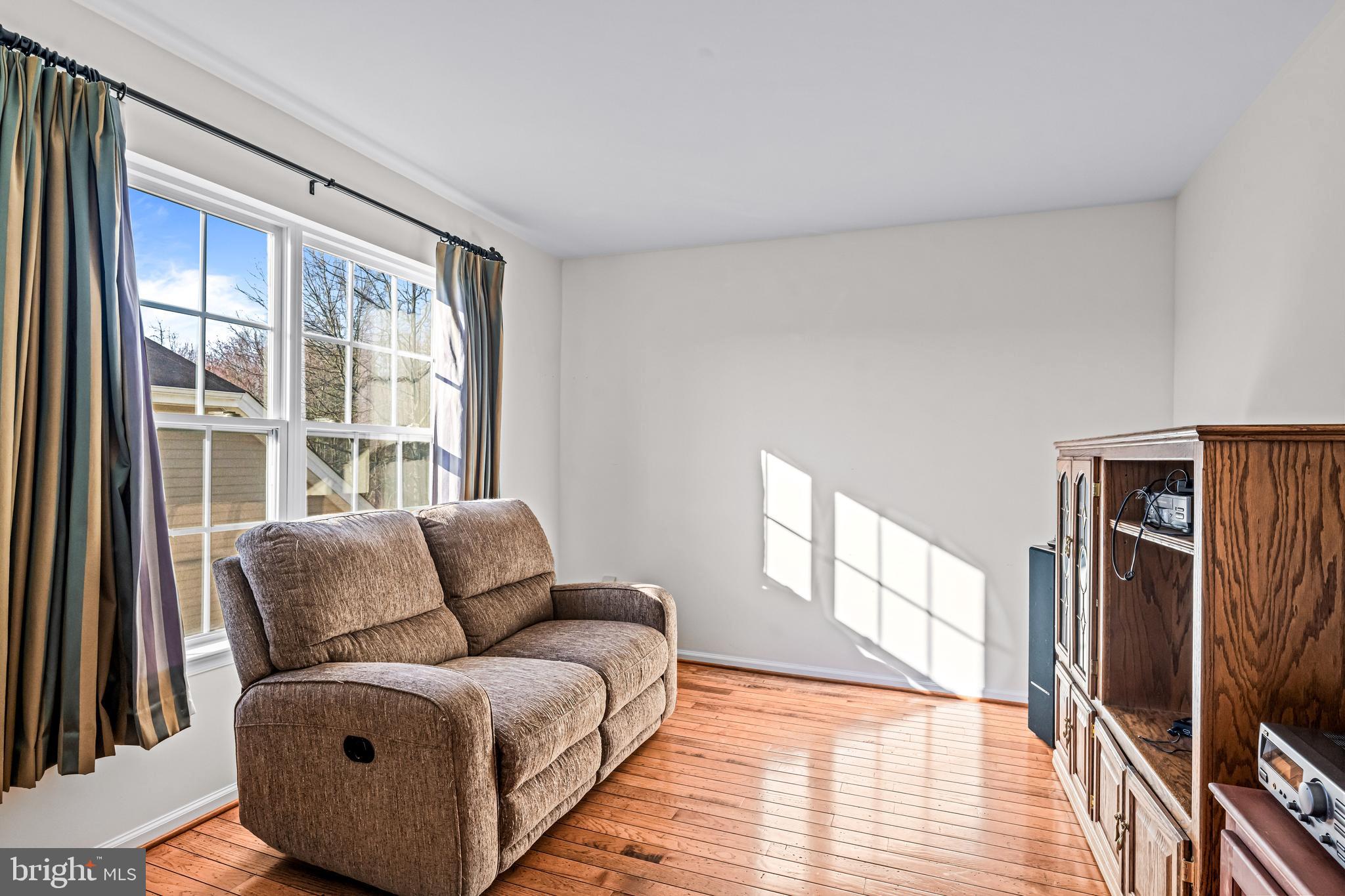 1200 Creekside Lane Quakertown, PA 18951 - Photo 27 of 37 a living room with furniture and a window