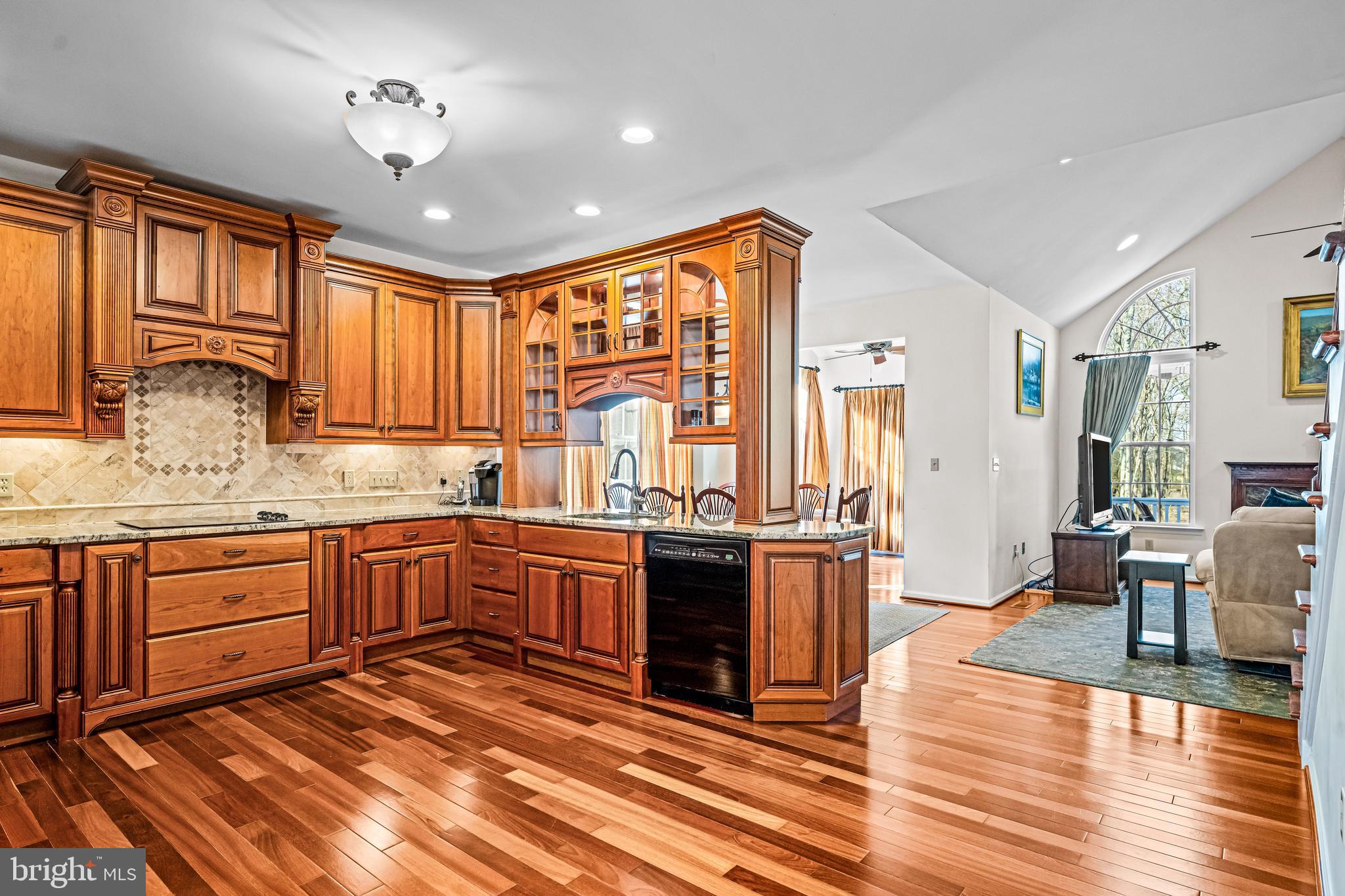 1200 Creekside Lane Quakertown, PA 18951 - Photo 6 of 37 a large kitchen with stainless steel appliances granite countertop a stove refrigerator and cabinets