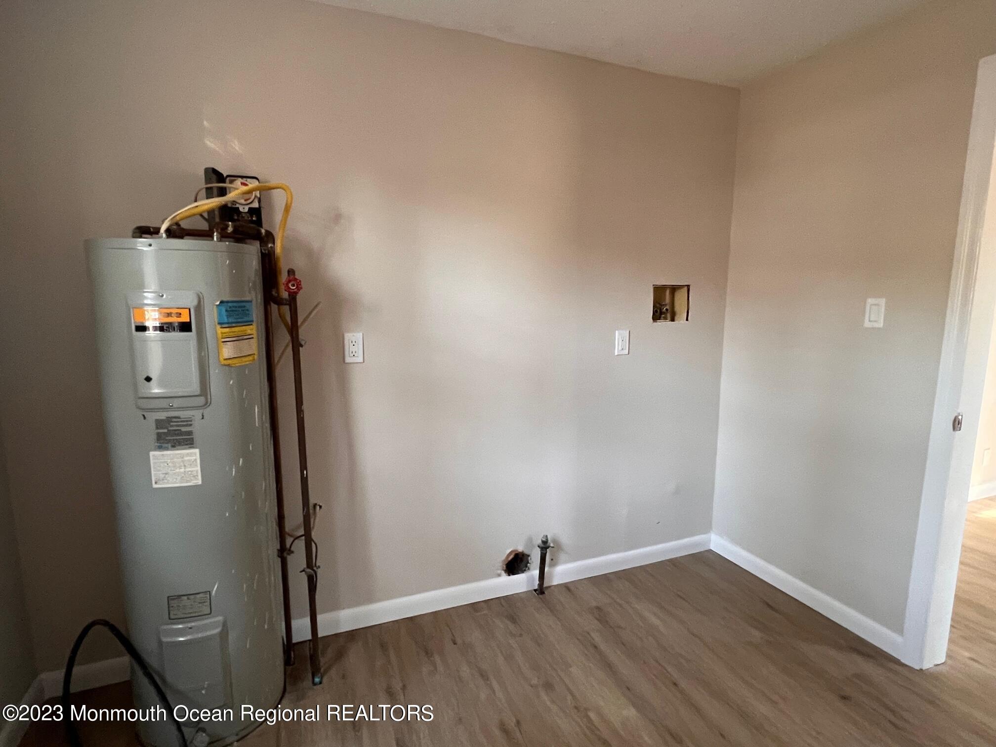 16 Walnut Street Waretown, NJ 08758 - Photo 10 of 12 a view of empty room with wooden floor