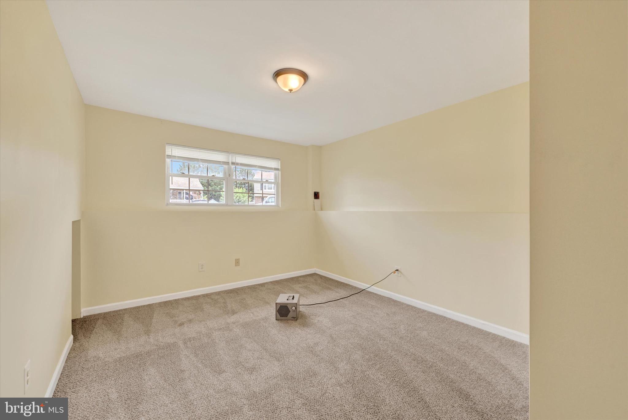 21 Box Circle Baltimore, MD 21221 - Photo 19 of 23 an empty room with windows