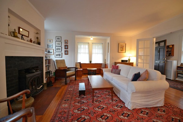 6 Pine Ridge Road Wellesley, MA 02481 - Photo 2 of 11 a living room with furniture and a fireplace