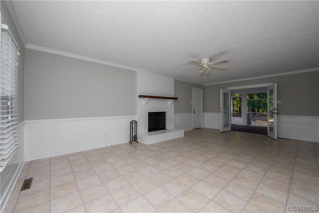 14200 Chepstow Road Midlothian, VA 23113 - Photo 11 of 41 an empty room with windows and fireplace