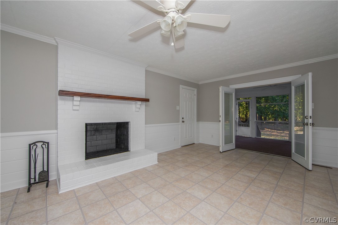 14200 Chepstow Road Midlothian, VA 23113 - Photo 12 of 41 a view of an empty room with a fireplace and a window