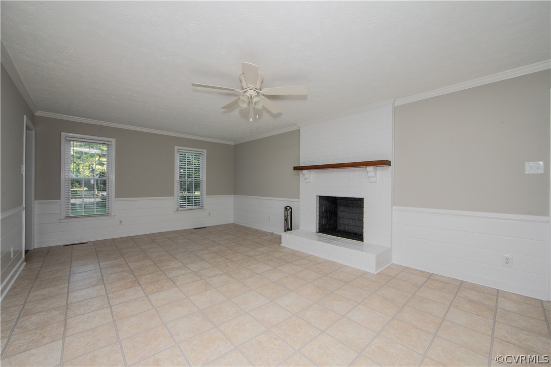14200 Chepstow Road Midlothian, VA 23113 - Photo 13 of 41 an empty room with windows and fireplace