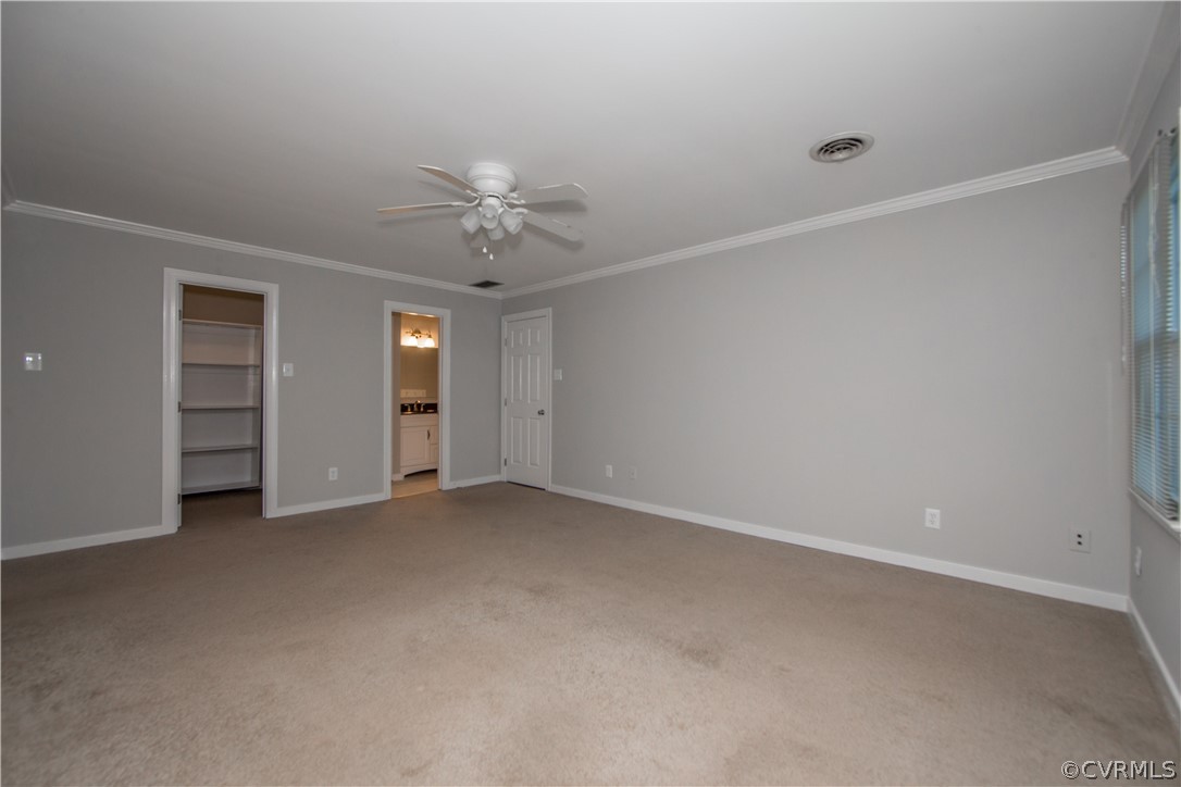 14200 Chepstow Road Midlothian, VA 23113 - Photo 25 of 41 an empty room with chandelier fan and windows