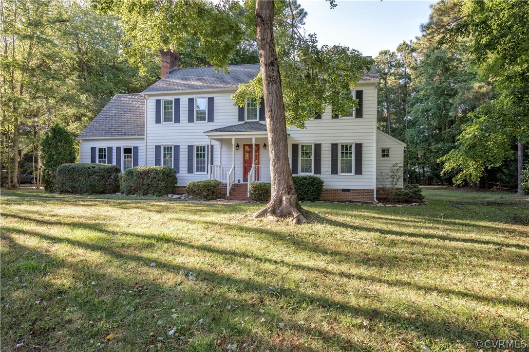 14200 Chepstow Road Midlothian, VA 23113 - Photo 4 of 41 a view of a house with a big yard and large trees
