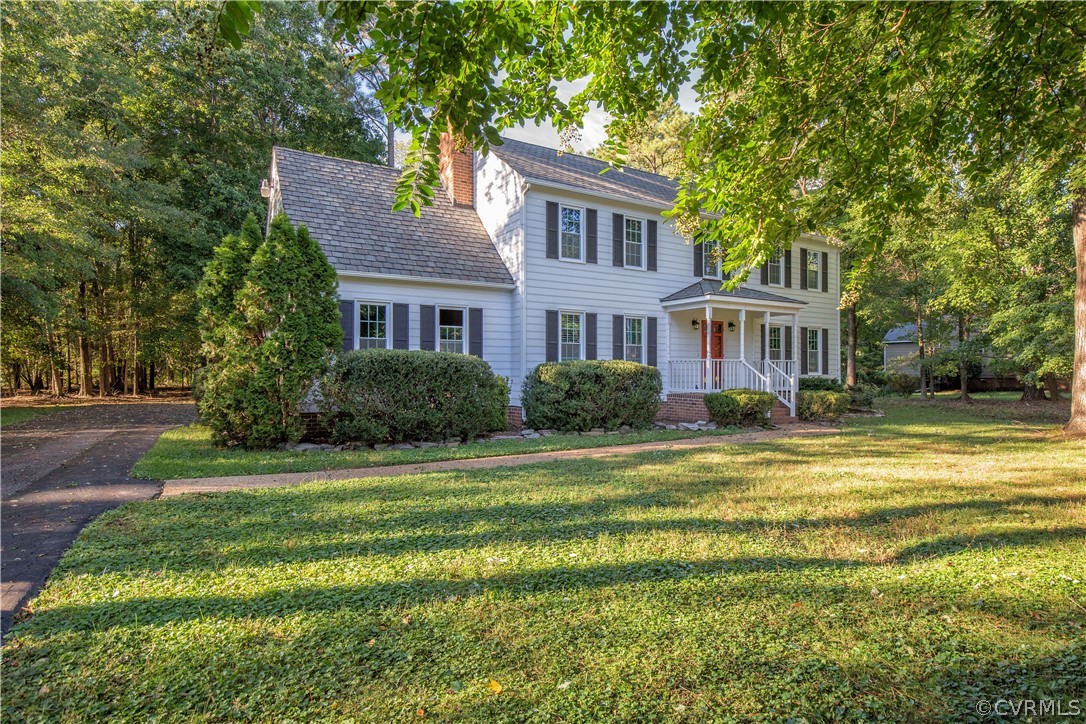 14200 Chepstow Road Midlothian, VA 23113 - Photo 5 of 41 a view of a house with a swimming pool