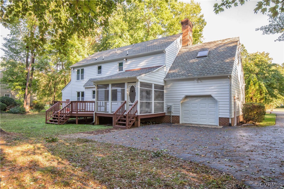 14200 Chepstow Road Midlothian, VA 23113 - Photo 7 of 41 a view of a house with a yard and roof