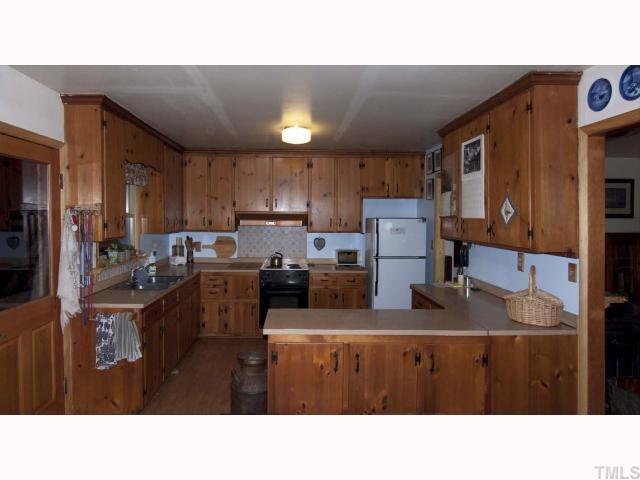 5208 Olive Road Raleigh, NC 27606 - Photo 5 of 11 kitchen