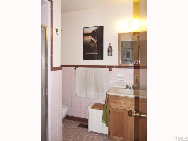 5208 Olive Road Raleigh, NC 27606 - Photo 6 of 11 hall bathroom