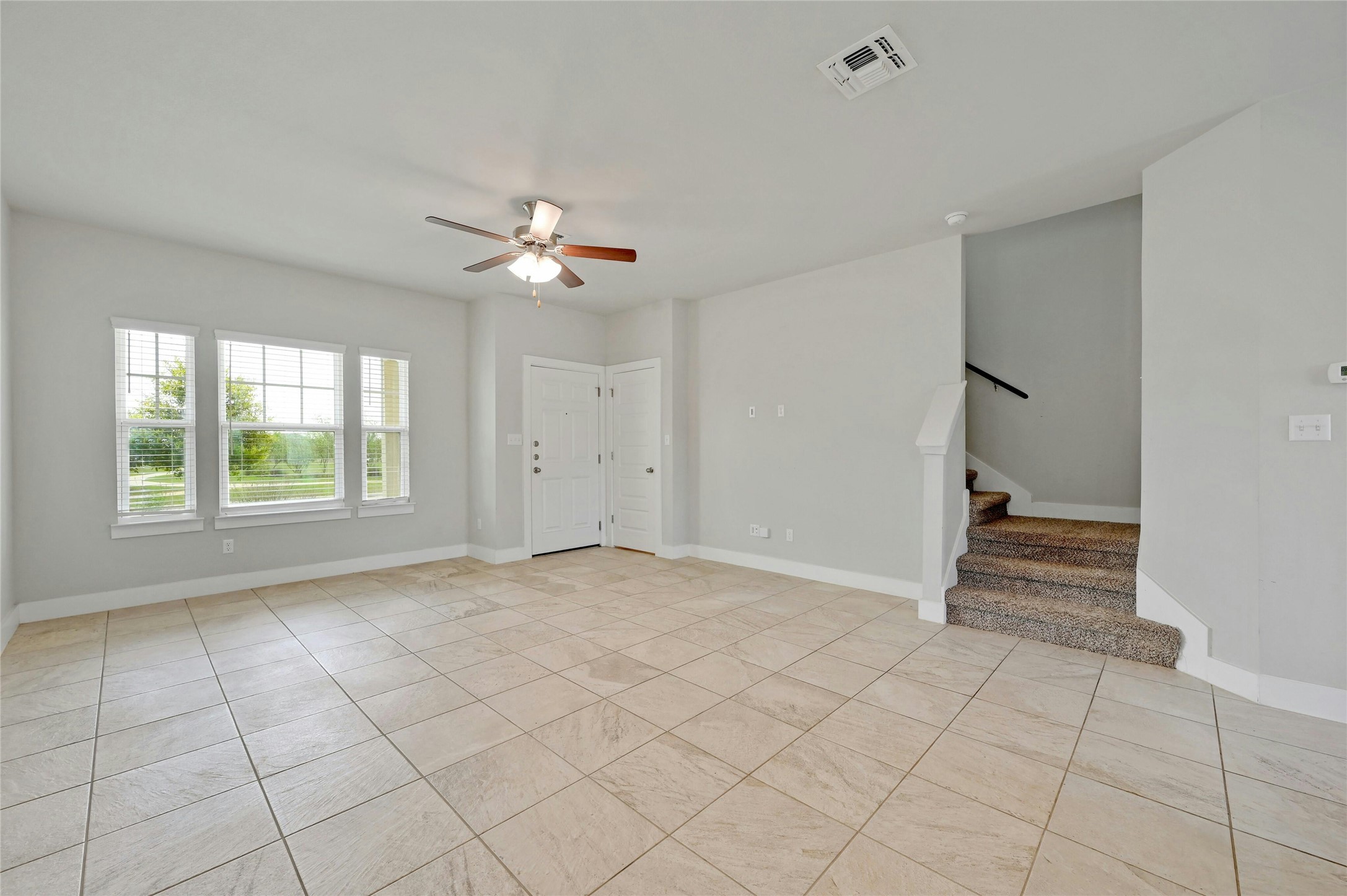 121 Switchgrass Street San Marcos, TX 78666 - Photo 9 of 33 Stairway to bedrooms on the 2nd floor.