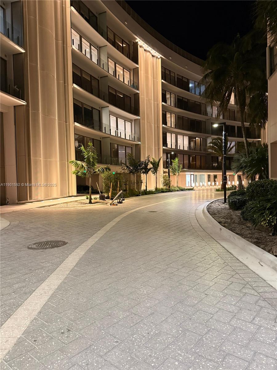 5 Grove Isle Drive, Unit S502 Coconut Grove, FL 33133 - Photo 12 of 19 a view of a building with a street