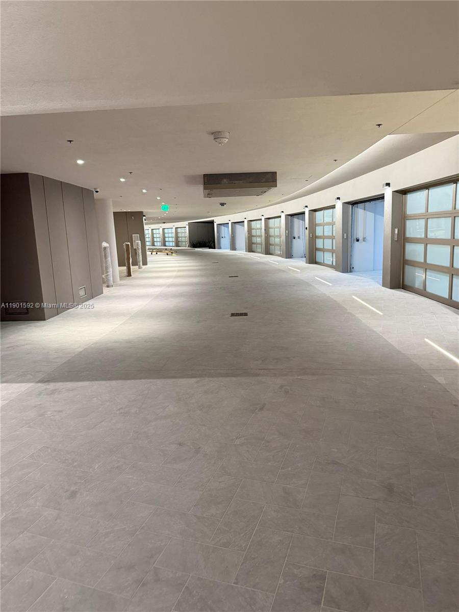 5 Grove Isle Drive, Unit S502 Coconut Grove, FL 33133 - Photo 15 of 19 a big room with closet and windows