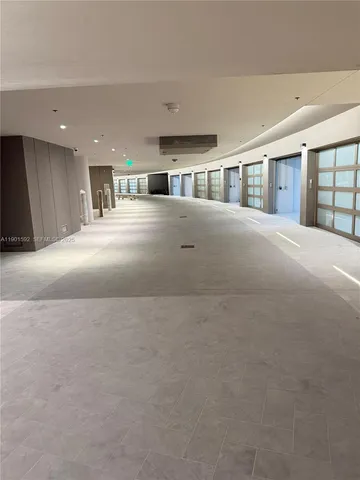 a big room with closet and windows