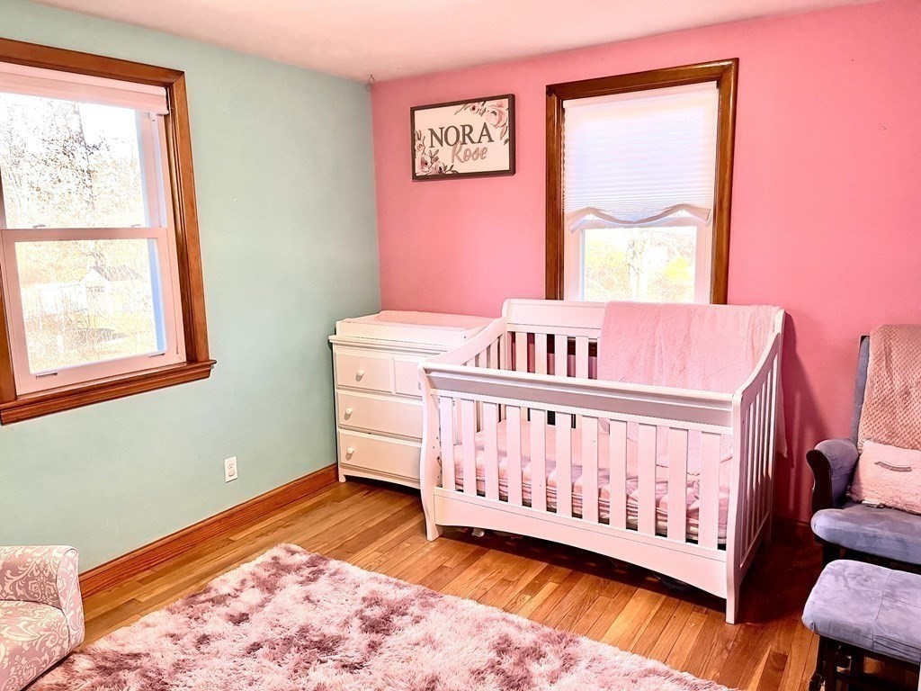 41 Lelland Road Stoughton, MA 02072 - Photo 19 of 29 a bedroom with furniture and a window