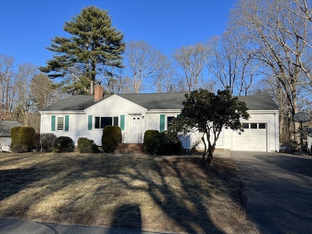 41 Lelland Road Stoughton, MA 02072 - Photo 26 of 29 a front view of a house with a yard
