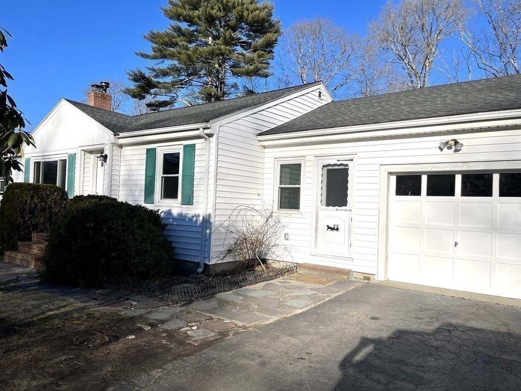 41 Lelland Road Stoughton, MA 02072 - Photo 28 of 29 a front view of a house with a yard