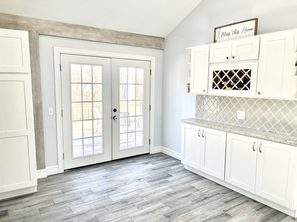 41 Lelland Road Stoughton, MA 02072 - Photo 8 of 29 a view of a kitchen with wooden floor