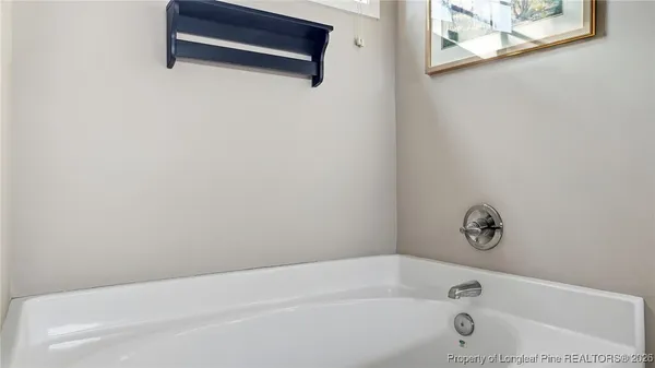 a bathroom with a bathtub